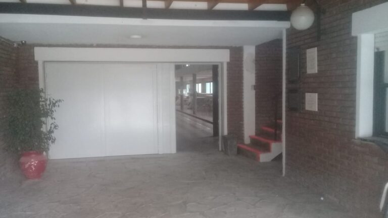 Cambio portón reglamentario gimnasio habilitación bomberos